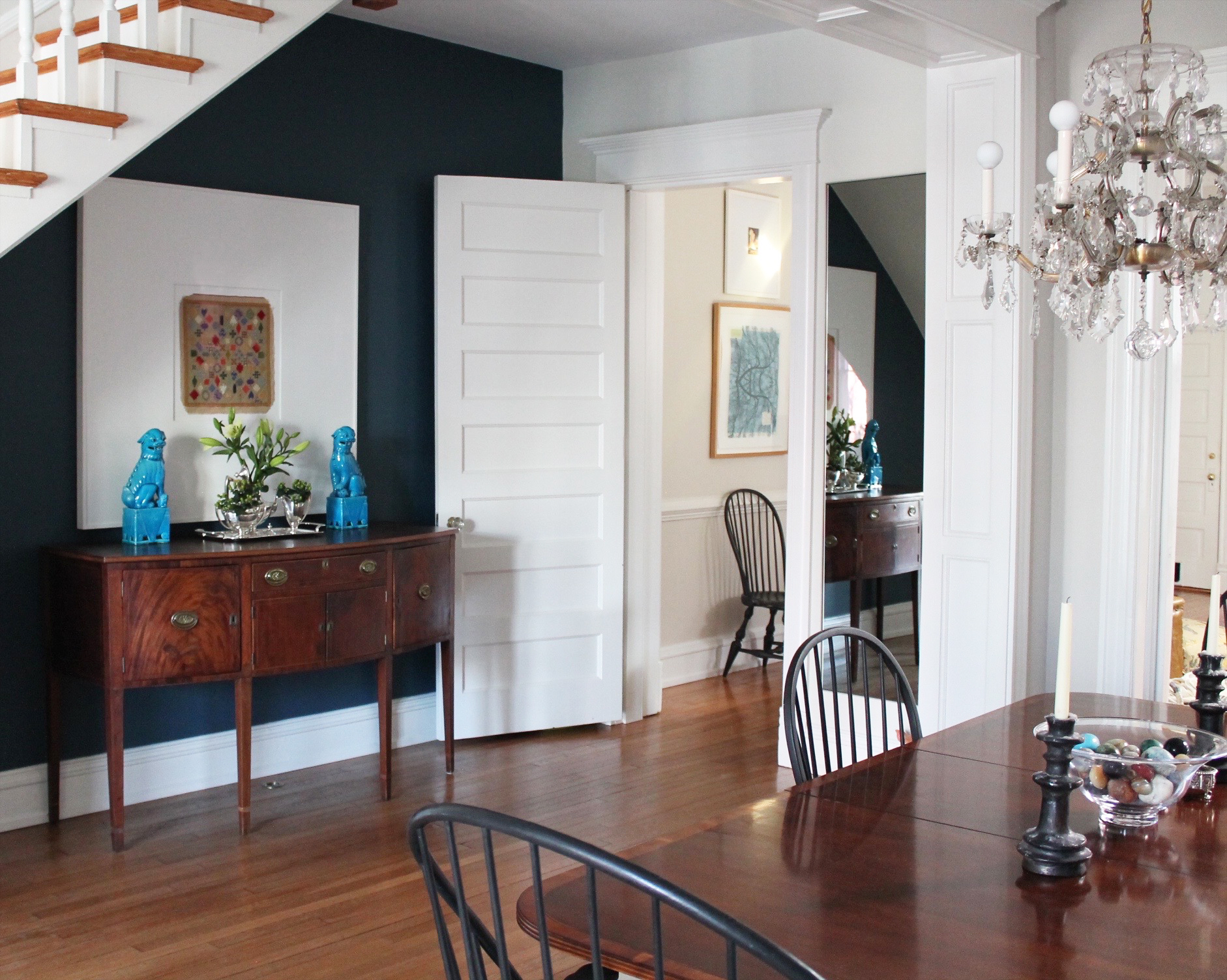 dining room, navy accent wall, anne tollett interiors, custom blue, foo dogs, dining room